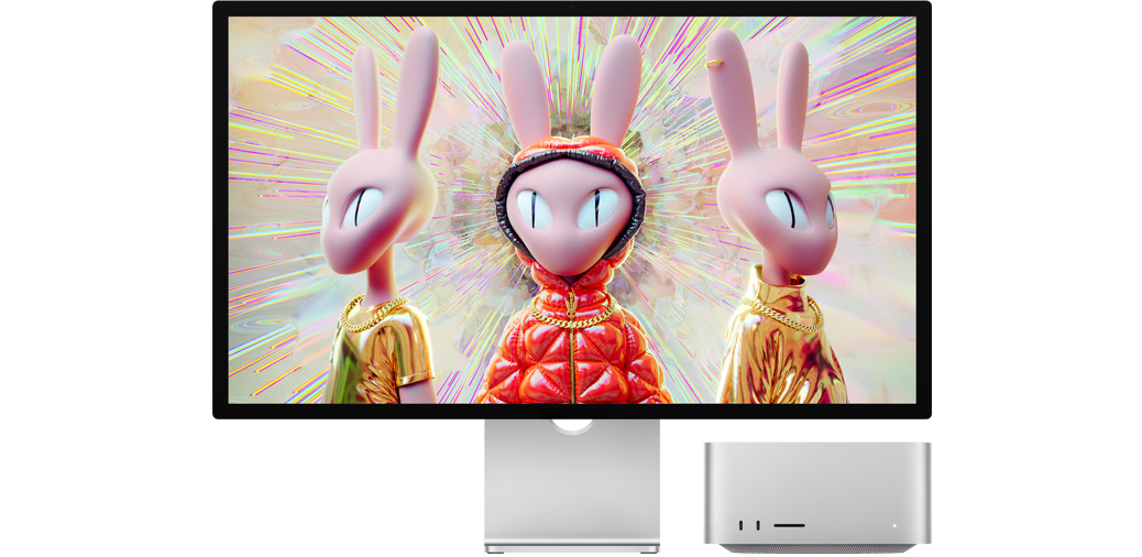 Mac Studio 和 Studio Display 并排放置，屏幕上展示三維人形兔形象圖片。
